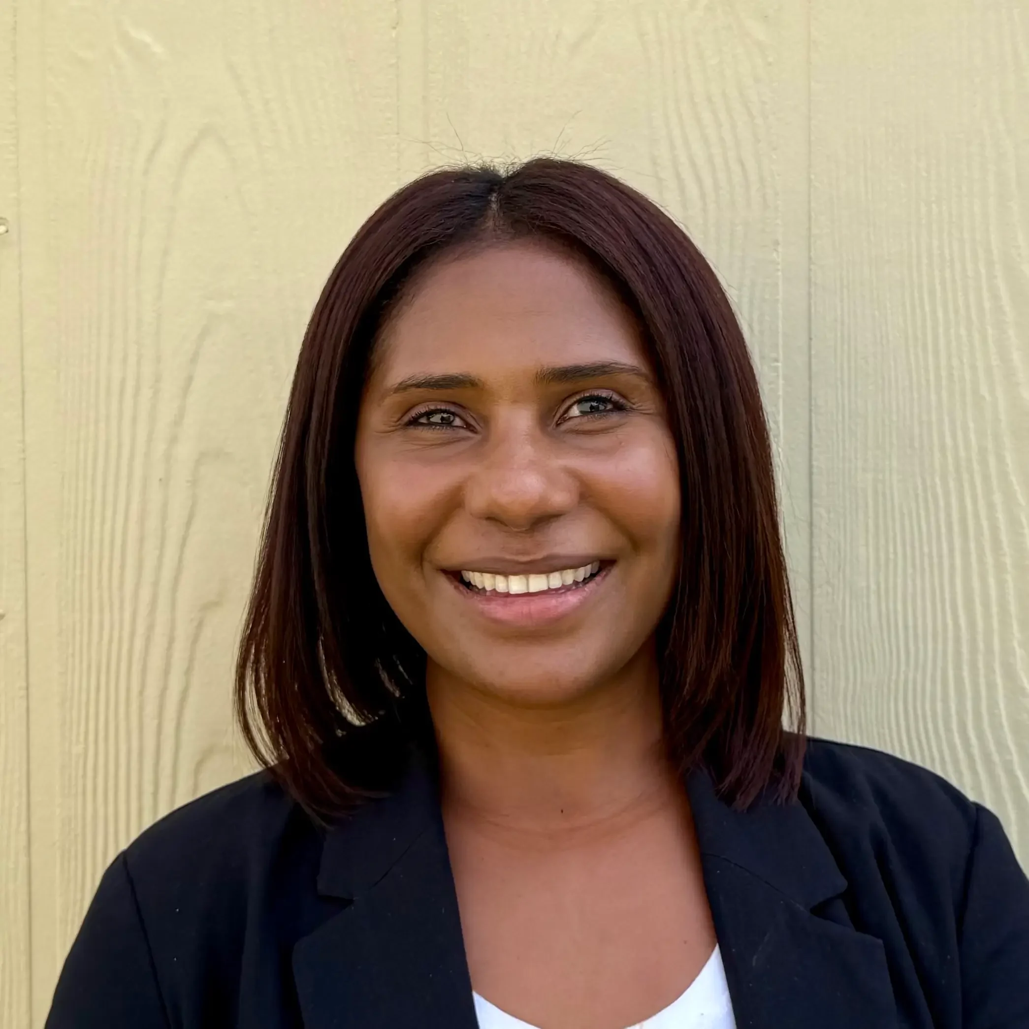 Parent of an Osceola Adventist Christian School student smiling at the camera